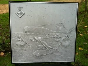 A memorial plaque depicting HMS Tuna and the Cockleshell Heroes