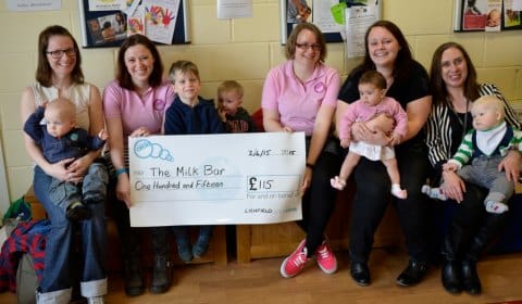 Members of the Four Oaks Milk Bar receive their donation from Lichfield Ladies Circle