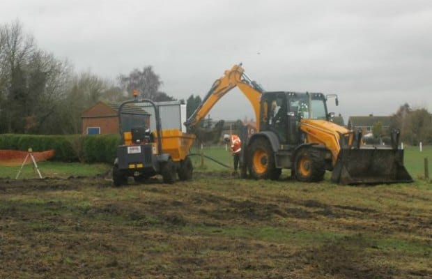 Diggers start work on transforming wasteland into tennis courts. Pic: Alrewas Tennis Club