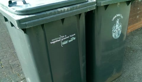 Bins with the Lichfield District Council and Tamworth Borough Council logos on