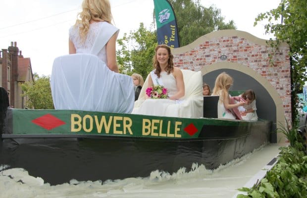 The Bower Belle 'sailing' through Lichfield city centre on Bower Day