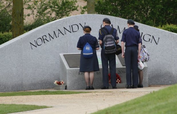 Visitors look at the Normandy Campaign Memorial