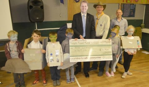Matthew Ellis with Beavers from 7th Lichfield Scout Group, Group Scout Leader Adrian Grew (centre) and Scout Group Chairman Mike Armstrong