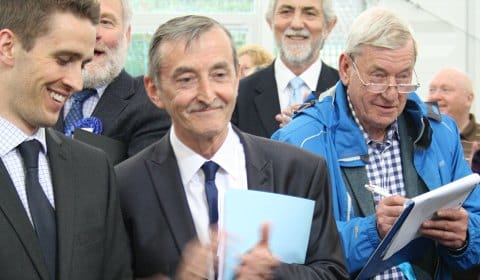 Mike Wilcox celebrates a positive result with other Conservative candidates