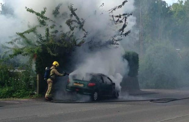 A firefighter tackles the blaze this morning. Pic: Nigel Storr
