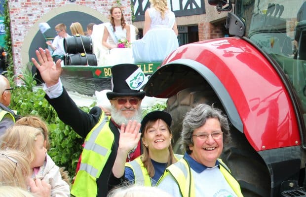 Christine Howles (bottom centre) taking part in the Lichfield Bower with the Lichfield and Hatherton Canals Restoration Trust float
