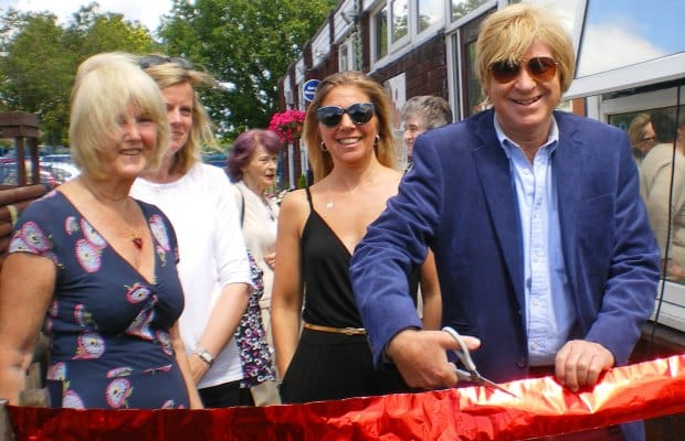 Michael Fabricant cuts the ribbon on the summer fayre in Longdon