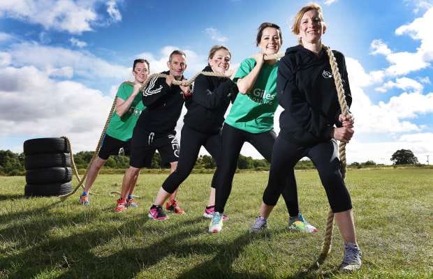 Aaron Coleman, Pete Woollard, Karen Coleman, Laura Collins, and Liz Woollard prepare for the St Giles Mud Challenge 