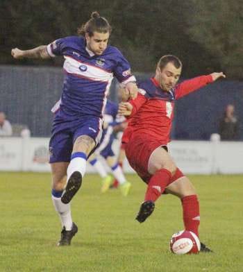 James Dance battles for the ball. Pic: Dave Birt