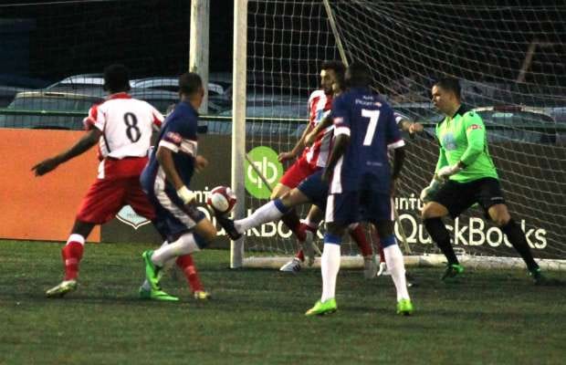 James Dance reacts first to flick the ball home. Pic: Dave Birt