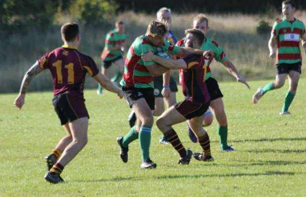 Graham Shelley tries to burst through a tackle. Pic: Joanne Gough