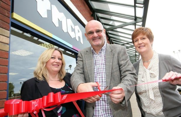 Pamela Rose, Andy Horsnail and Julie Mees of YMCA open the charity’s new shop at Three Spires Shopping Centre