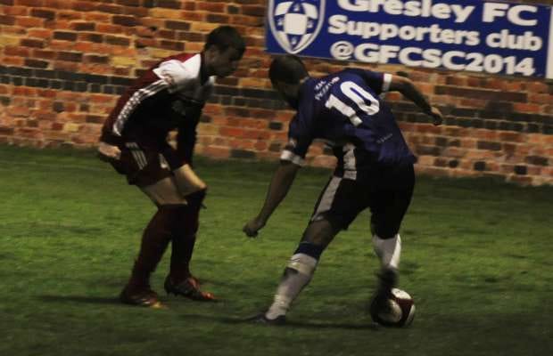 Paul Sullivan trys to get pass his man. Pic: Pamela Mullins