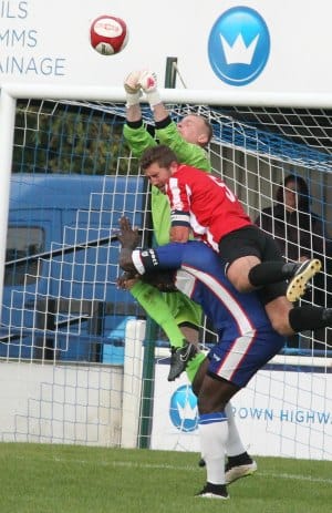 Goalkeeper John Bateman climbs highest. Pic: Dave Birt