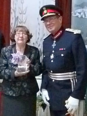 Barbara Marshall receives the group's Queen's Award for Voluntary Service