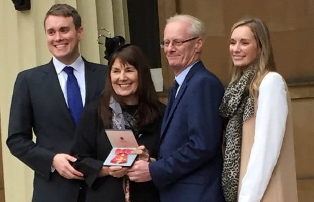 Marg Randles celebrates her OBE with members of her family