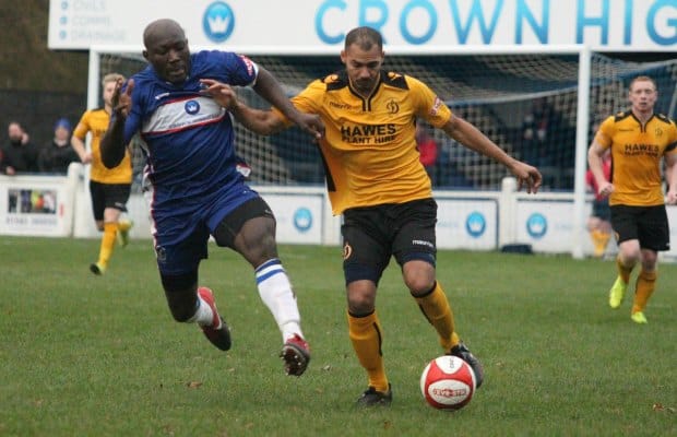 Debutant Henry Eze closes down a Loughborough player. Pic: Dave Birt