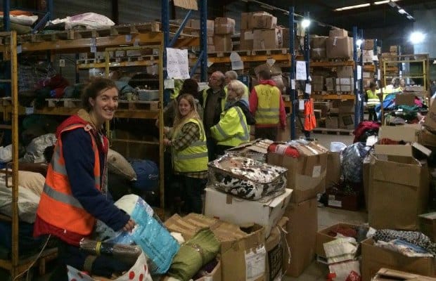 Volunteers sorting clothes and blankets. Pic: Dave Simcox
