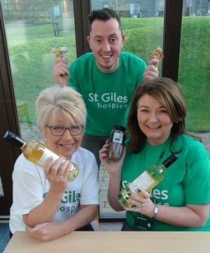 Anne Arnott, Aaron Coleman and Natalie Ellis getting ready to Give It Up for St Giles