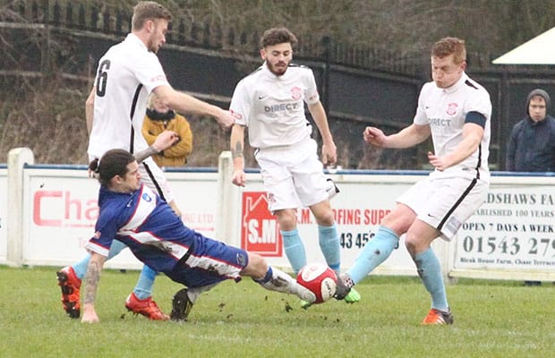 James Dance slides in to make the challenge. Pic: Dave Birt