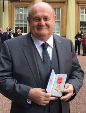 John Woodward with his OBE