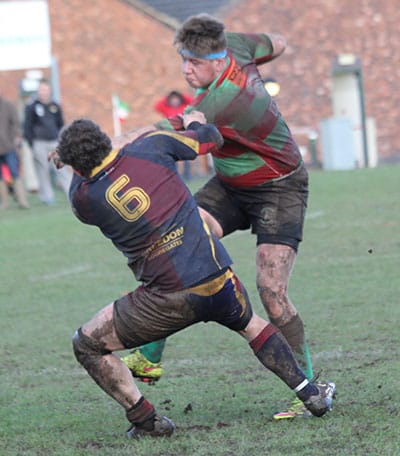 Sean Latham tries to break through a tackle. Pic: Joanne Gough