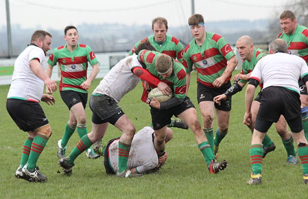 Alan Mapp tries to burst through a tackle. Pic: Joanne Gough
