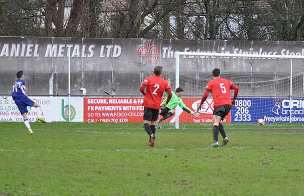 George Washbourne beats the keeper to double Chasetown's advantage. Pic: Pamela Mullins