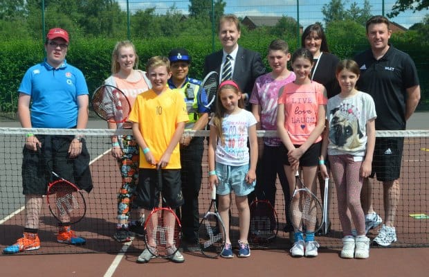 Police and Crime Commissioner Matthew Ellis with youngsters at a Space tennis session