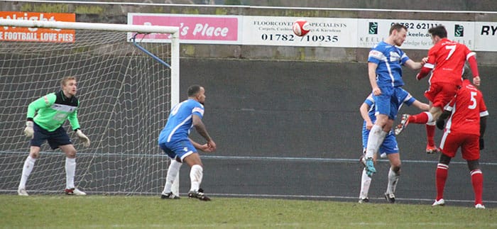 George Washbourne heads home an equaliser for Chasetown. Pic: Dave Birt