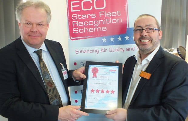 Cllr Colin Greatorex presenting an ECO Stars certificate to a representative from Sainsbury’s
