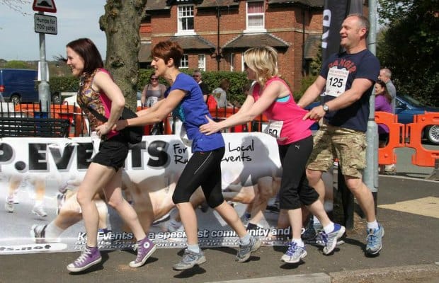 Competitors conga their way round the world's shortest fun run course