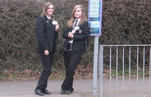 Teenagers Francesca and Amy with their Your Staffordfshire Cards