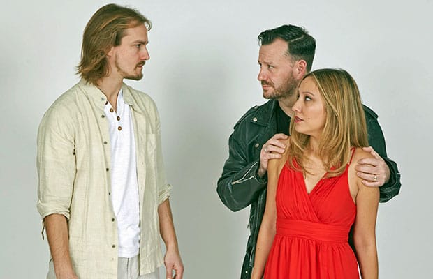 Eoin Edwards as Jesus, Victoria Beck as Mary and Phil Bourne as Judas in Lichfield Operatic Society's Jesus Christ Superstar