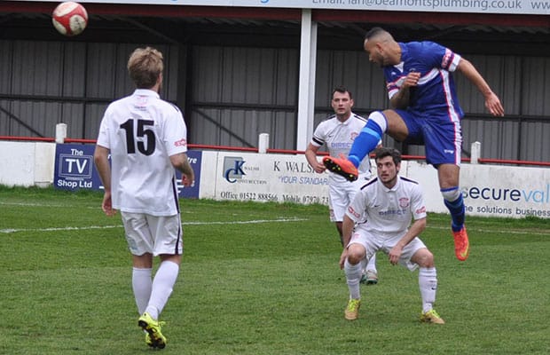 Nick Turton heads the ball. Pic: Pamela Mullins