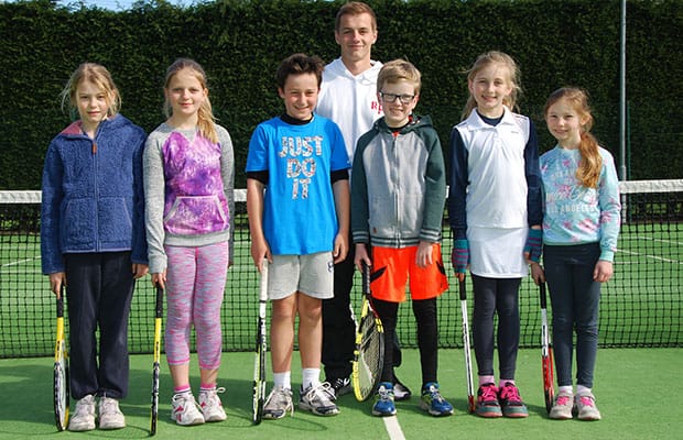 Young players Ella Jeggins, Rachel Bennett, Sebastian Fisher, George Davies, Lucy Keeling and Hannah Sirag with coach Michael Hampson