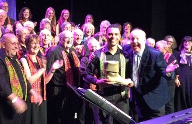Members of the Lichfield Gospel Choir with Jimmy Cricket