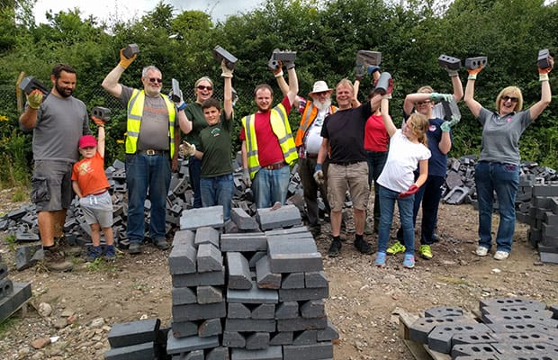 The scouts and their helpers sorting bricks for the Lichfield Canal