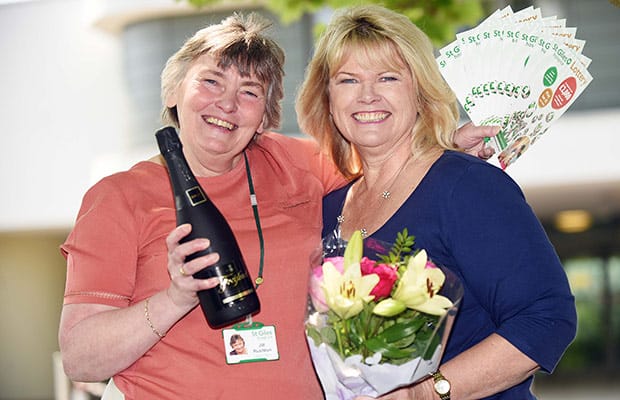 Jo Rushton from St Giles Hospice with winner Alison Barker