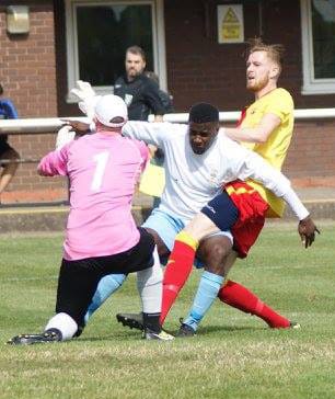 Studley's goalkeeper and a defender thwart a Lichfield City attack. Pic: Mick Tyler