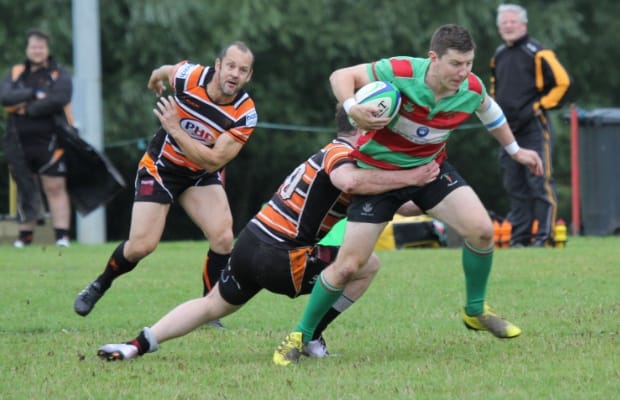 Burntwood's Ben Holt tries to burst through a tackle. Pic: Joanne Gough