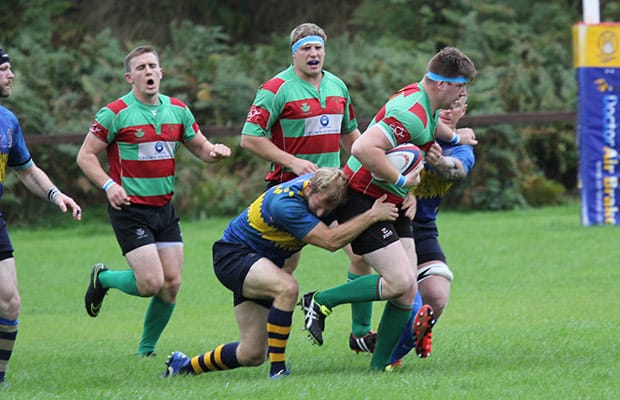 Burntwood skipper Sean Latham holds off a tackle. Pic: Joanne Gough