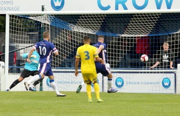 Mitch Piggon gives Chasetown an early lead against Grantham. Pic: Dave Birt