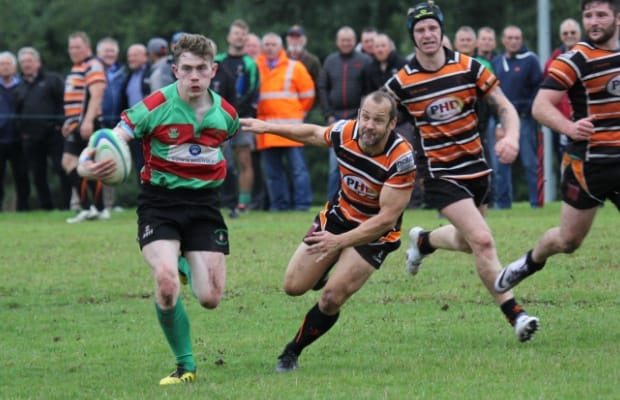 Neil Holden breaks away with the ball. Pic: Joanne Gough