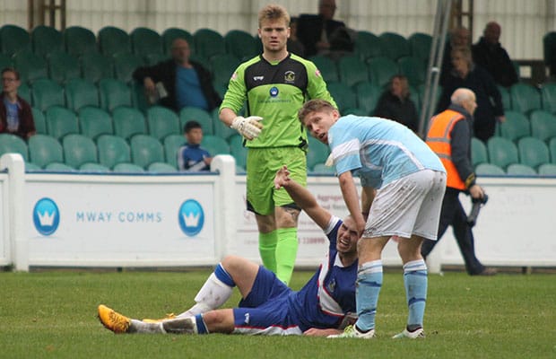 Injured midfielder Josh Craddock calls to the bench. Pic: Dave Birt