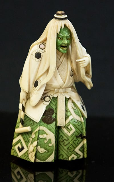 An ivory Japanese Meiji period shibayama okimono of a ferocious actor which sold for £950