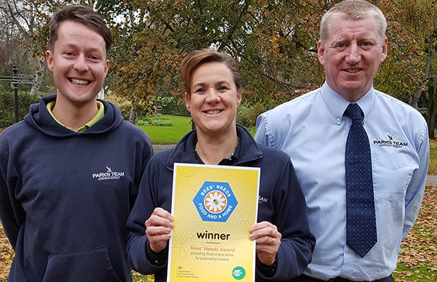 Park ranger Peter Freeman, Historic Parks manager Lyn Hammant greens and open spaces strategic manager John Smith with the award