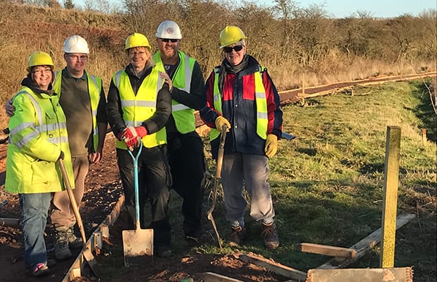 Staff from the Police Mutual Asssurance Society offices in Lichfield who extended the Heritage Towpath Trail at Summerhill