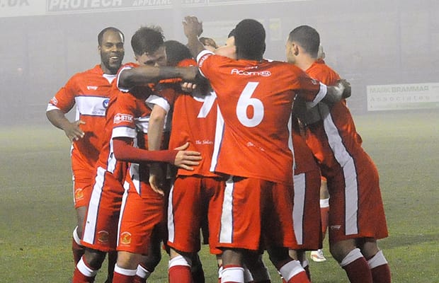 Chasetown's players celebrate with Mitch Piggon. Pic: Pamela Mullins