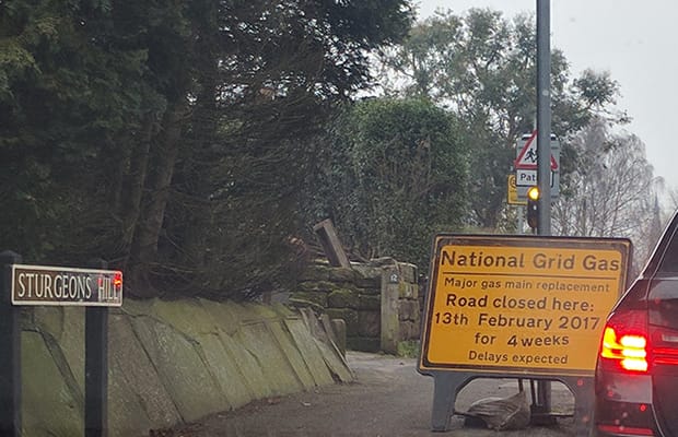 Signs warning drivers of the Sturgeons Hill closure
